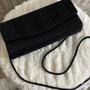 Glittery black clutch